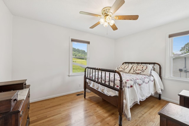 1710 New Highway 7, Columbia, TN 38401 - bedroom featuring multiple windows, light wood-style floors, and ceiling fan