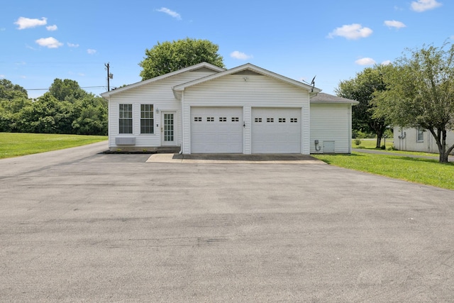 1710 New Highway 7, Columbia, TN 38401 - view of front of home featuring driveway, a garage, and a front yard