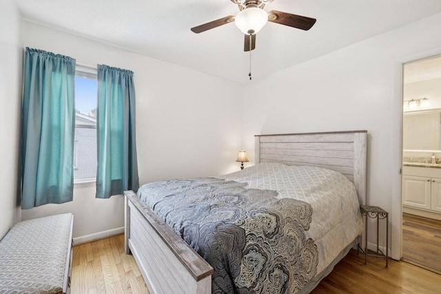 1710 New Highway 7, Columbia, TN 38401 - bedroom featuring wood finished floors, ceiling fan, and ensuite bathroom