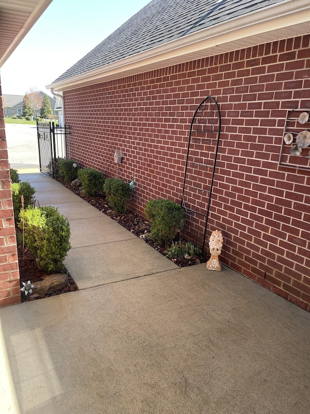 395 Devon Chase Hl Unit 3002, Gallatin, TN 37066 - view of home's exterior with roof with shingles and brick siding