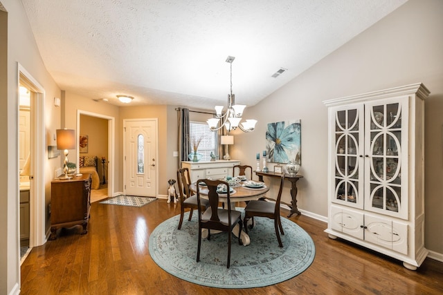 395 Devon Chase Hl Unit 3002, Gallatin, TN 37066 - dining space featuring a chandelier, lofted ceiling, wood finished floors, and a textured ceiling