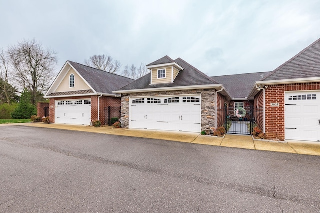 395 Devon Chase Hl Unit 3002, Gallatin, TN 37066 - view of front facade with a shingled roof, stone siding, and brick siding