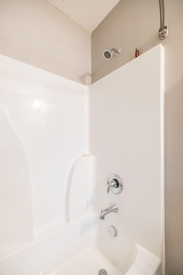 395 Devon Chase Hl Unit 3002, Gallatin, TN 37066 - full bathroom featuring shower / bath combination and a textured ceiling