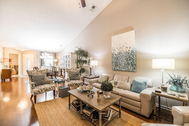 395 Devon Chase Hl Unit 3002, Gallatin, TN 37066 - living room with wood finished floors, high vaulted ceiling, a chandelier, and a ceiling fan
