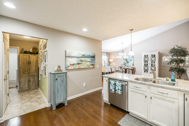 395 Devon Chase Hl Unit 3002, Gallatin, TN 37066 - kitchen with dishwasher, dark wood finished floors, white cabinets, pendant lighting, and light countertops