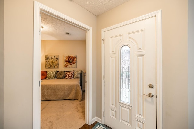 395 Devon Chase Hl Unit 3002, Gallatin, TN 37066 - entrance foyer featuring a textured ceiling and carpet floors