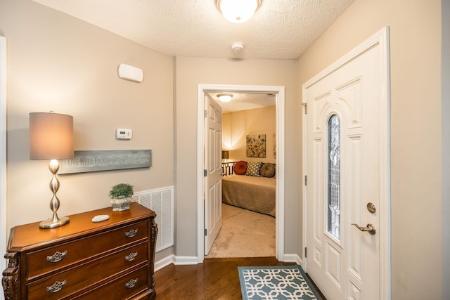 395 Devon Chase Hl Unit 3002, Gallatin, TN 37066 - foyer entrance with dark wood-style flooring and a textured ceiling