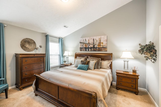 395 Devon Chase Hl Unit 3002, Gallatin, TN 37066 - bedroom featuring light colored carpet, lofted ceiling, and a textured ceiling