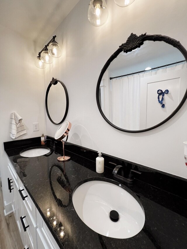 543 2nd Ave N, Lewisburg, TN 37091 - bathroom with double vanity and wood finished floors