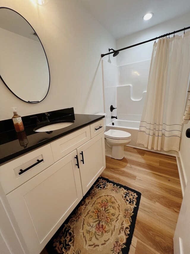 543 2nd Ave N, Lewisburg, TN 37091 - bathroom with vanity, wood finished floors, shower / tub combo, and recessed lighting