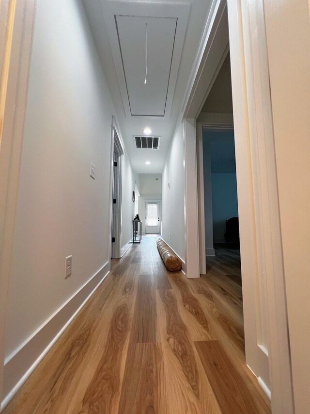 543 2nd Ave N, Lewisburg, TN 37091 - corridor with attic access and wood finished floors