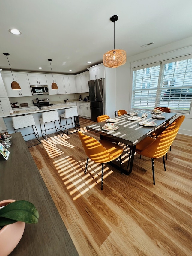 543 2nd Ave N, Lewisburg, TN 37091 - dining space featuring light wood-type flooring and recessed lighting
