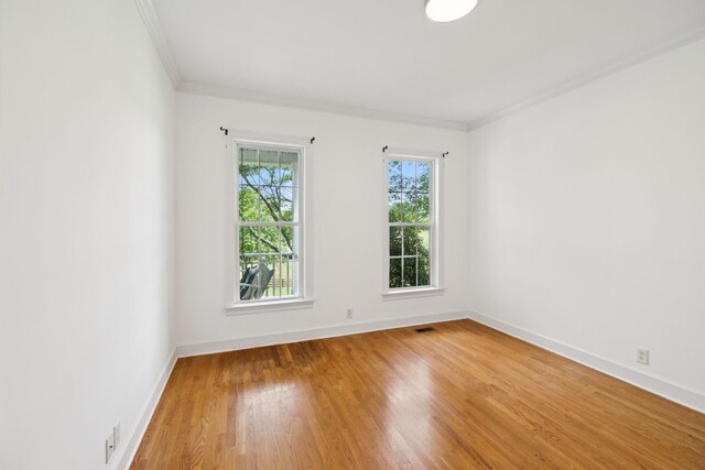 1387 Floyd Rd, Eagleville, TN 37060 - spare room with crown molding and light wood-type flooring
