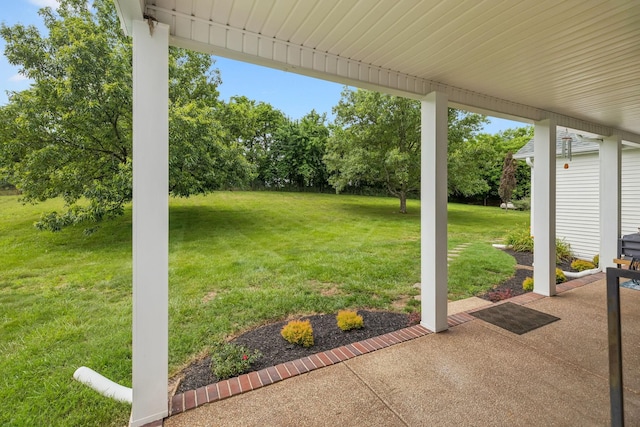 1387 Floyd Rd, Eagleville, TN 37060 - view of grassy yard with a patio area and view of wooded area