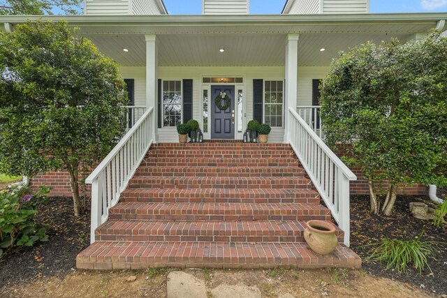 1387 Floyd Rd, Eagleville, TN 37060 - doorway to property with a chimney and covered porch