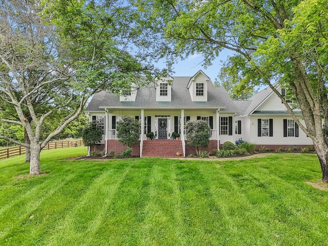 1387 Floyd Rd, Eagleville, TN 37060 - cape cod house featuring a porch and roof with shingles