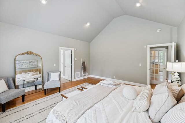1387 Floyd Rd, Eagleville, TN 37060 - bedroom with vaulted ceiling, wood finished floors, and recessed lighting