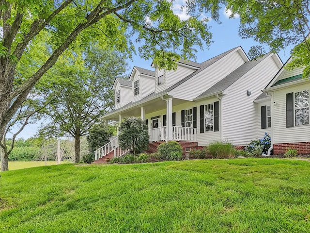 1387 Floyd Rd, Eagleville, TN 37060 - cape cod home featuring a porch, a front lawn, and a shingled roof