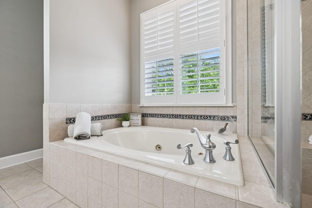 1387 Floyd Rd, Eagleville, TN 37060 - bathroom featuring a jetted tub and tile patterned floors