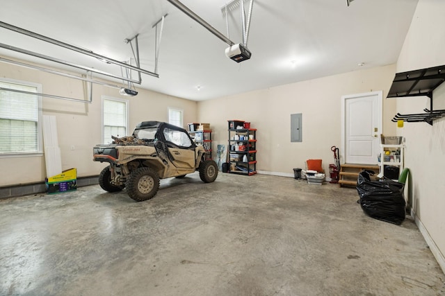 1387 Floyd Rd, Eagleville, TN 37060 - garage featuring electric panel and a garage door opener