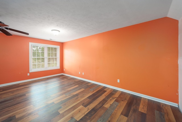 118 Stonebridge, Selmer, TN 38375 - empty room featuring dark wood-style floors, a ceiling fan, and a textured ceiling