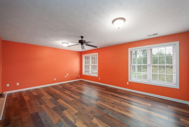 118 Stonebridge, Selmer, TN 38375 - unfurnished room featuring a textured ceiling, wood finished floors, and ceiling fan