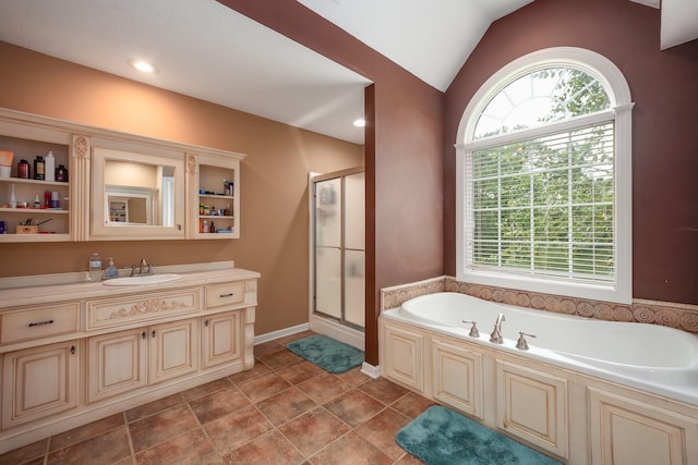 118 Stonebridge, Selmer, TN 38375 - bathroom featuring a bath, a stall shower, vanity, and lofted ceiling