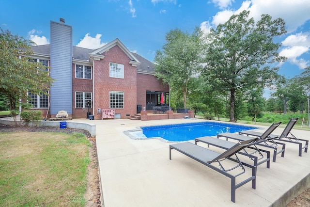 118 Stonebridge, Selmer, TN 38375 - outdoor pool featuring a patio area and a lawn