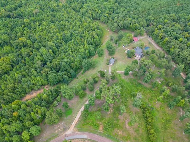 118 Stonebridge, Selmer, TN 38375 - aerial view of property and surrounding area with a heavily wooded area