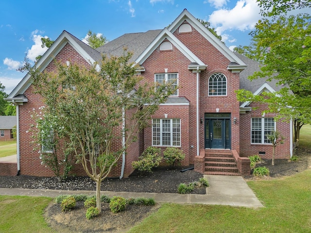118 Stonebridge, Selmer, TN 38375 - traditional home featuring brick siding, a front yard, and entry steps