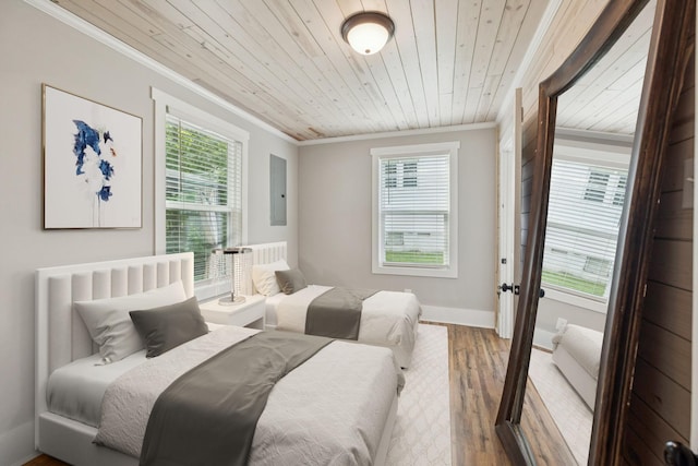 410 Campbell Ave, Tullahoma, TN 37388 - bedroom featuring ornamental molding, wood ceiling, multiple windows, wood finished floors, and electric panel