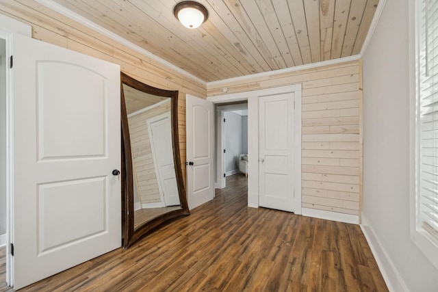 410 Campbell Ave, Tullahoma, TN 37388 - unfurnished bedroom with crown molding, dark wood-style floors, wood ceiling, and wooden walls