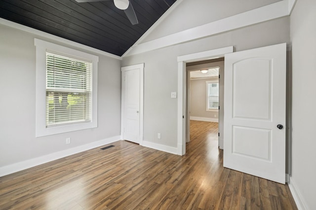 410 Campbell Ave, Tullahoma, TN 37388 - unfurnished bedroom with multiple windows, vaulted ceiling, wood finished floors, wood ceiling, and ceiling fan