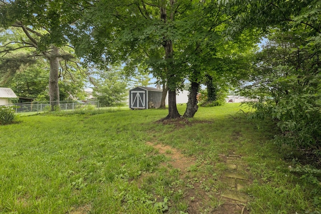 410 Campbell Ave, Tullahoma, TN 37388 - view of yard featuring a storage unit