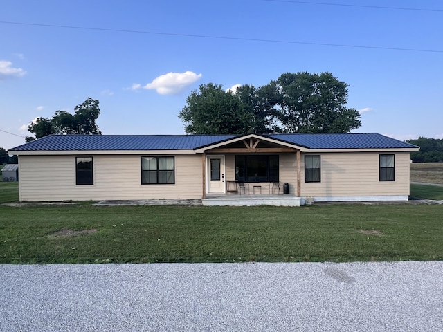 11 Jess Long Ln, Hillsboro, TN 37342 - view of front of house with a porch, a front lawn, and a metal roof
