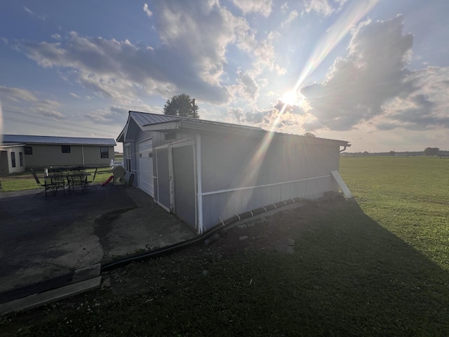 11 Jess Long Ln, Hillsboro, TN 37342 - view of home's exterior with a yard, a metal roof, and a garage
