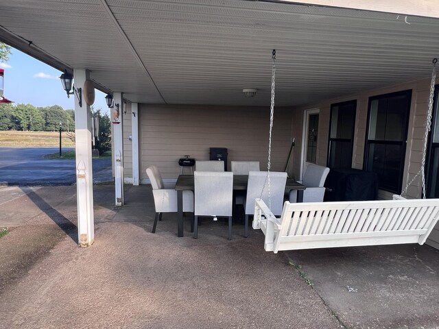 11 Jess Long Ln, Hillsboro, TN 37342 - view of patio featuring a carport and outdoor dining space