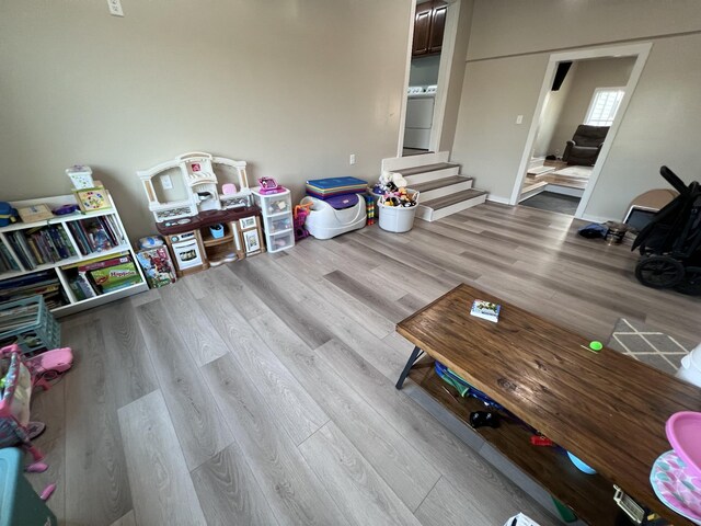 11 Jess Long Ln, Hillsboro, TN 37342 - living area featuring wood finished floors, washer / clothes dryer, and stairs