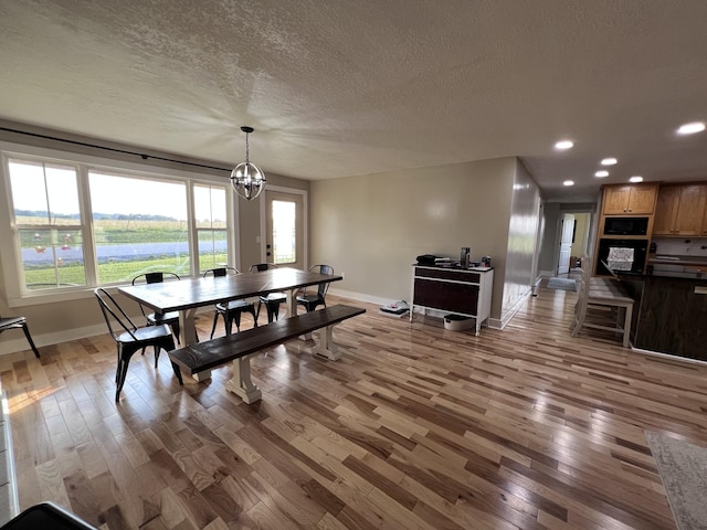 11 Jess Long Ln, Hillsboro, TN 37342 - dining space featuring light wood finished floors, a textured ceiling, a chandelier, and recessed lighting