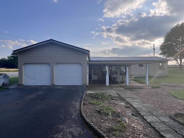 11 Jess Long Ln, Hillsboro, TN 37342 - ranch-style home featuring a porch, asphalt driveway, a metal roof, and an attached garage