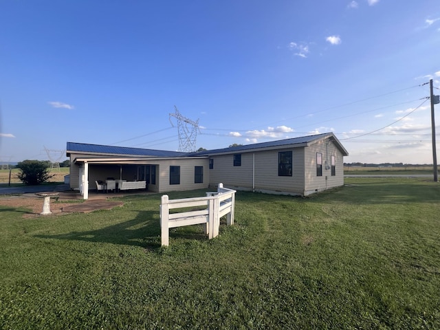 11 Jess Long Ln, Hillsboro, TN 37342 - rear view of property with a lawn, crawl space, and a metal roof