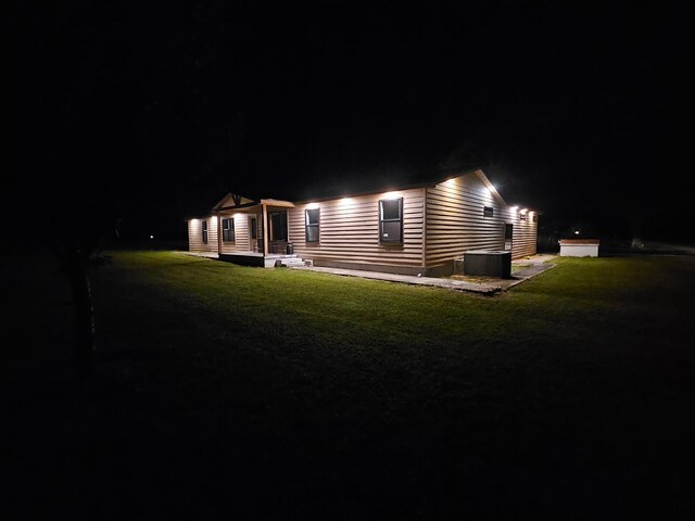 11 Jess Long Ln, Hillsboro, TN 37342 - back of house at twilight with a yard