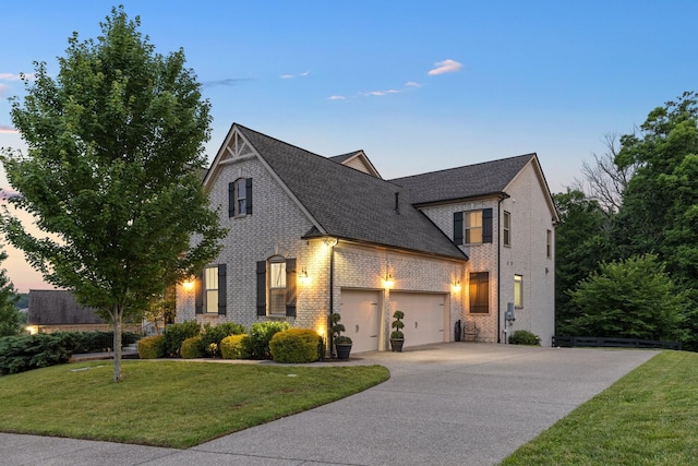 6826 Falls Ridge Ln, College Grove, TN 37046 - view of front of property featuring brick siding, concrete driveway, an attached garage, a yard, and roof with shingles
