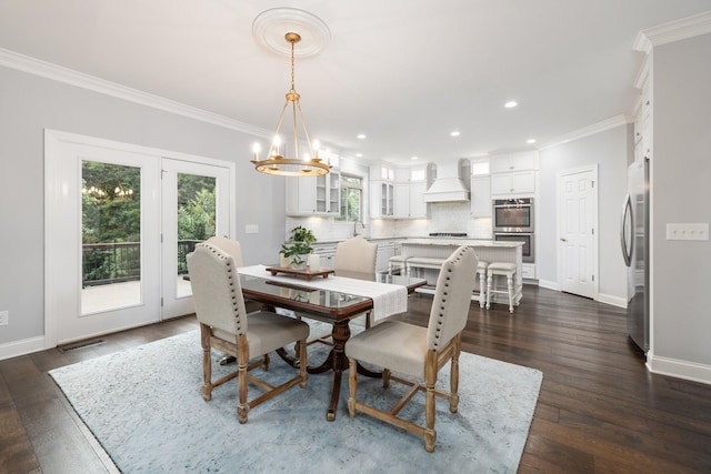 6826 Falls Ridge Ln, College Grove, TN 37046 - dining room with ornamental molding, a chandelier, dark wood-style flooring, and recessed lighting