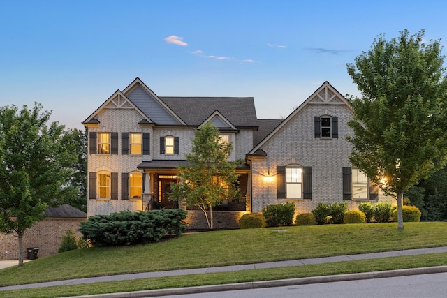 6826 Falls Ridge Ln, College Grove, TN 37046 - view of front of house featuring brick siding and a front lawn