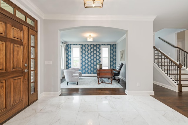 6826 Falls Ridge Ln, College Grove, TN 37046 - foyer entrance with arched walkways, crown molding, marble finish floors, stairs, and wallpapered walls