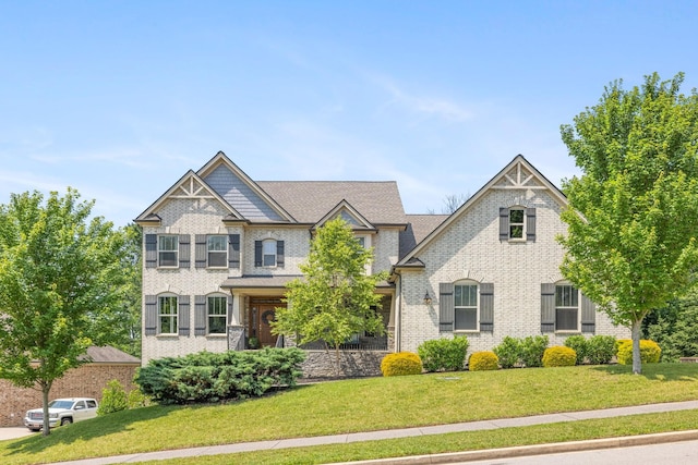 6826 Falls Ridge Ln, College Grove, TN 37046 - craftsman inspired home with a front lawn and brick siding
