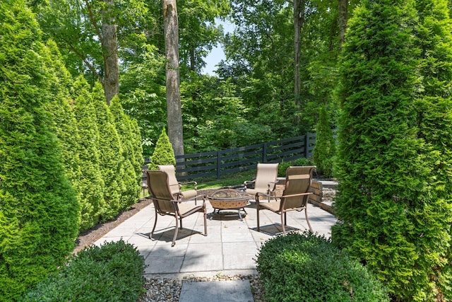 6826 Falls Ridge Ln, College Grove, TN 37046 - view of patio / terrace with a fire pit