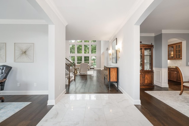 6826 Falls Ridge Ln, College Grove, TN 37046 - corridor with crown molding, arched walkways, and dark wood-type flooring