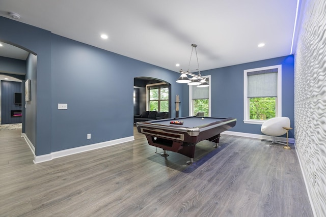 6826 Falls Ridge Ln, College Grove, TN 37046 - playroom with arched walkways, healthy amount of natural light, wood finished floors, and recessed lighting